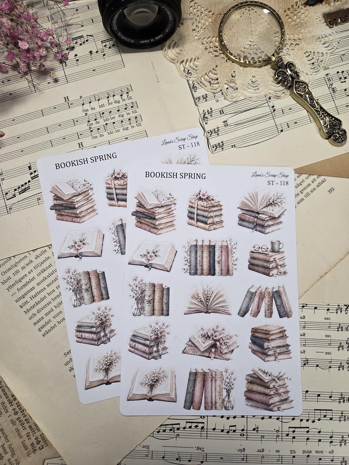 Two sticker sheets with a "Bookish Spring" theme. Each sheet features watercolour illustrations of stacks of books, open books, and floral accents in soft, muted tones.