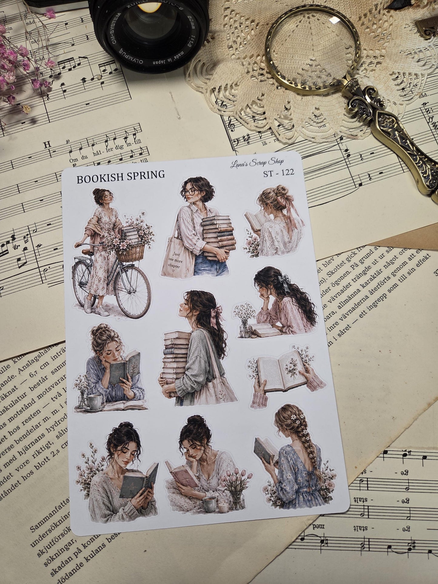 A sticker sheet labelled "Bookish Spring" with illustrations of women reading books, some with flowers and a bicycle. The illustrations are in soft pastel colours.