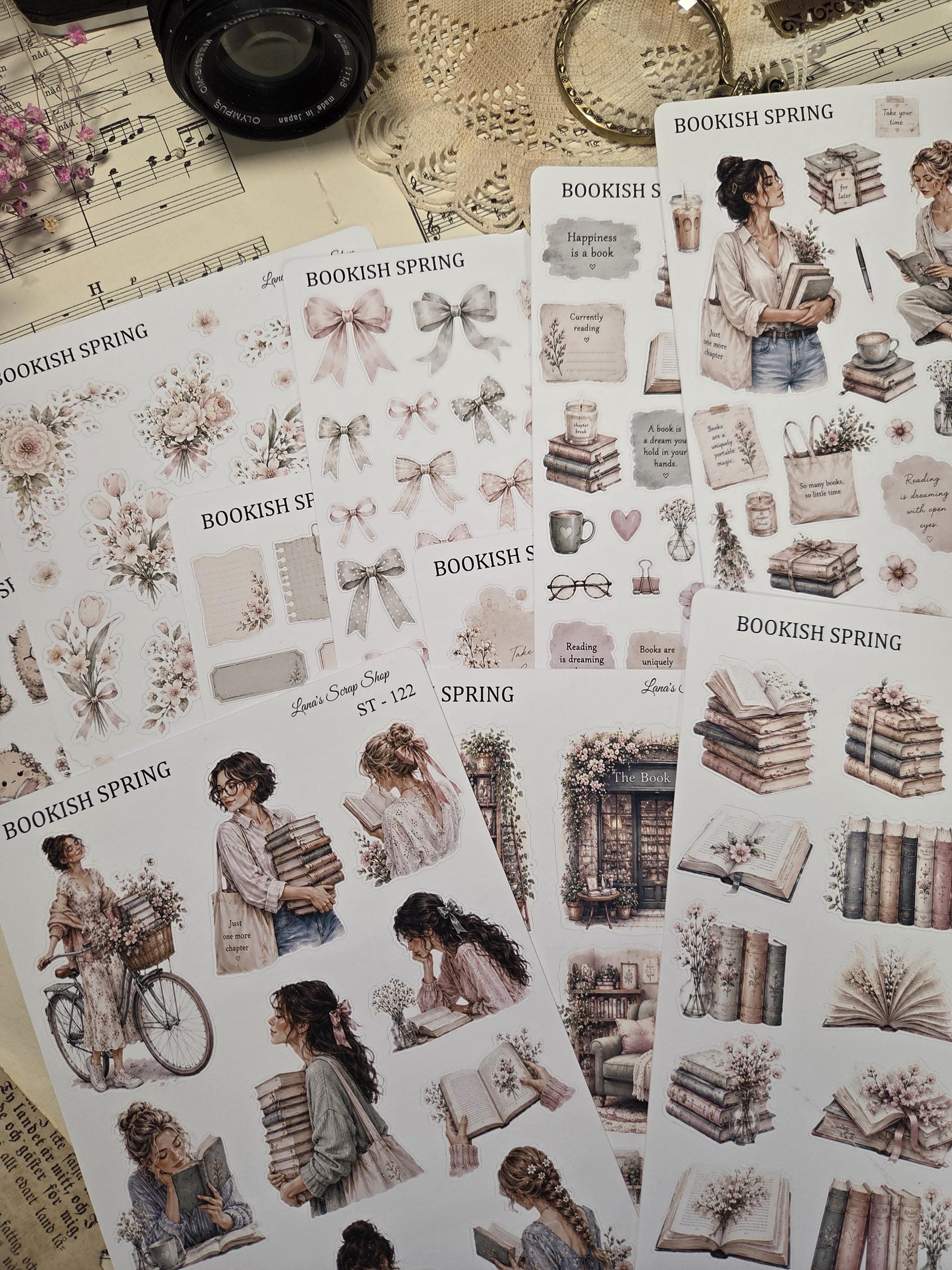 A selection of "Bookish Spring" sticker sheets. The stickers depict books, bows, floral designs, and women reading. The colour scheme includes soft pinks, creams, and browns.