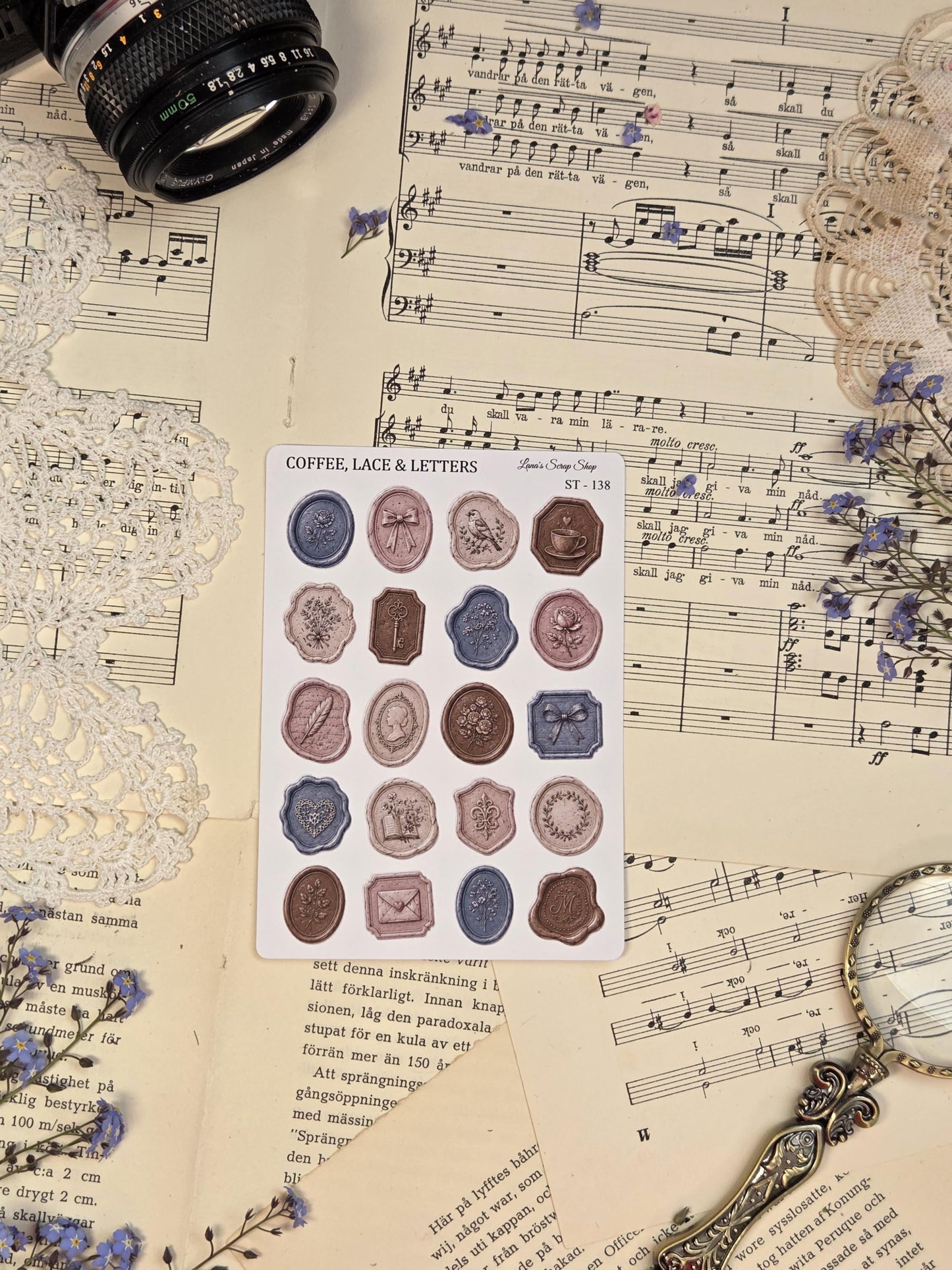 Vintage wax seal sticker sheet with romantic seal designs, antique textures, and elegant dusty blue and blush pink tones for journaling aesthetics.