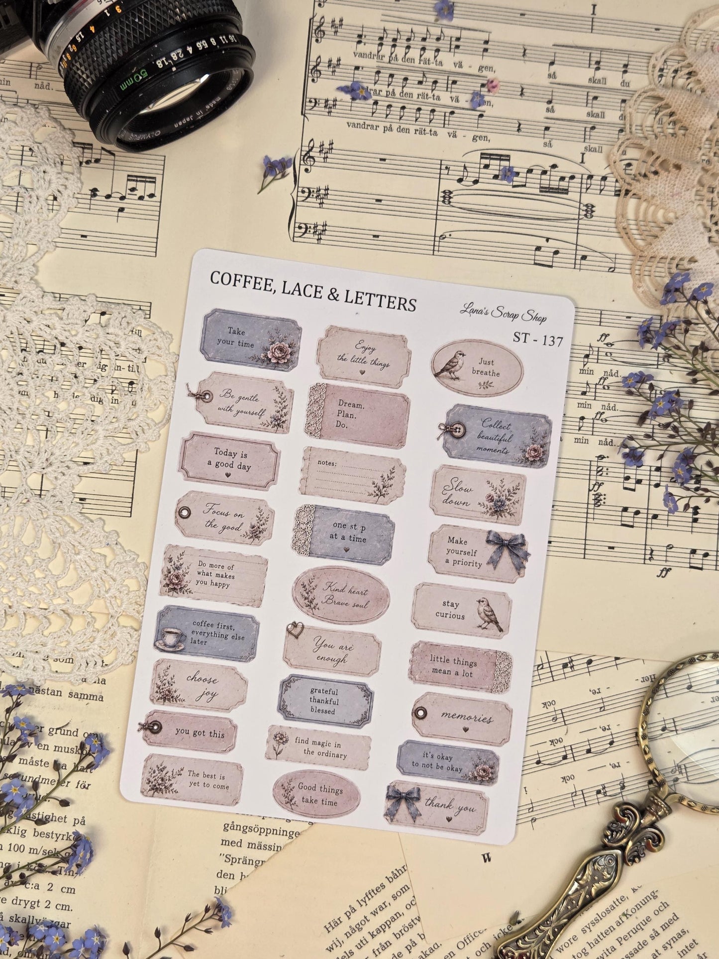 Decorative label sticker sheet with vintage-inspired phrases, journaling tags, lace textures, and soft feminine pastel details for planners and scrapbooks.
